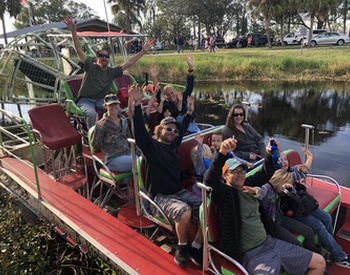 group of people on an airboat ride